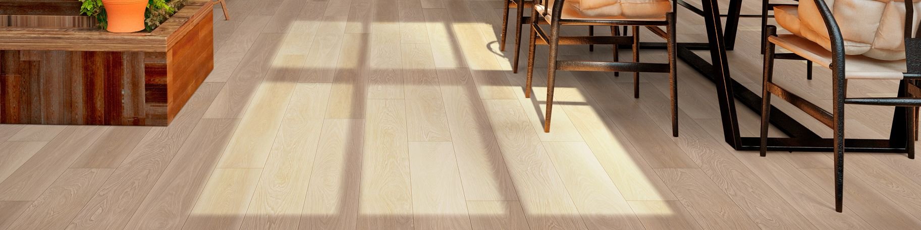 A dining room interior with hardwood floors