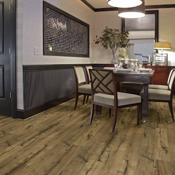 dining room with table and chairs on laminate floor