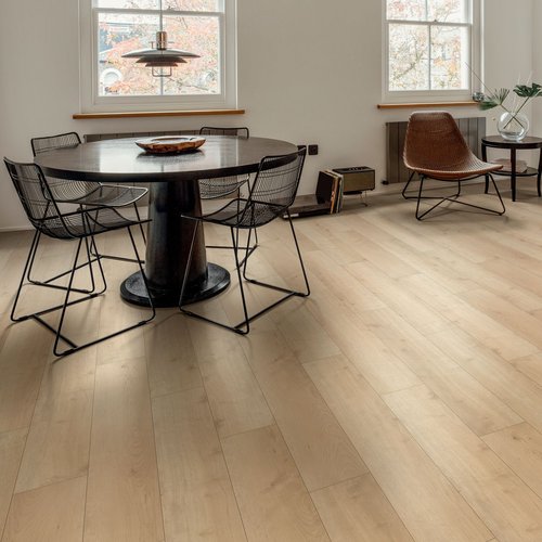 A dining room interior with laminate floors